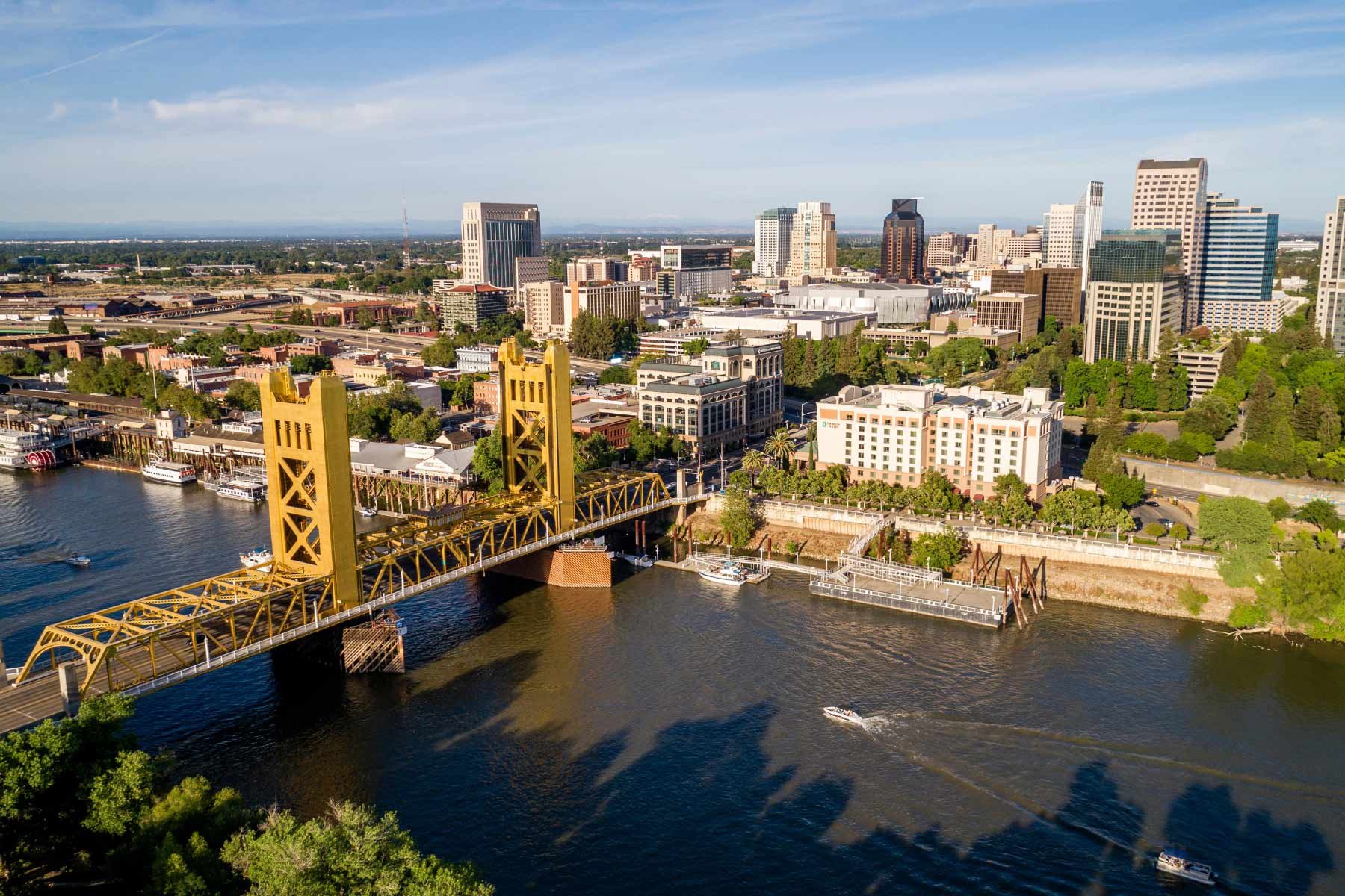Aerial view of downtown Sacramento with Tower Bridge spanning the Sacramento River Aerial view of downtown Sacramento with Tower Bridge spanning the Sacramento River