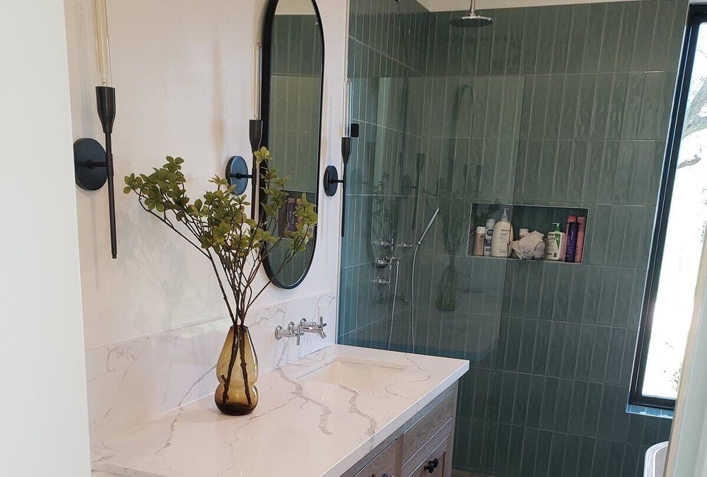 Contemporary bathroom remodel with green tiled shower and wood vanity by H&H Builds in Sacramento, CA