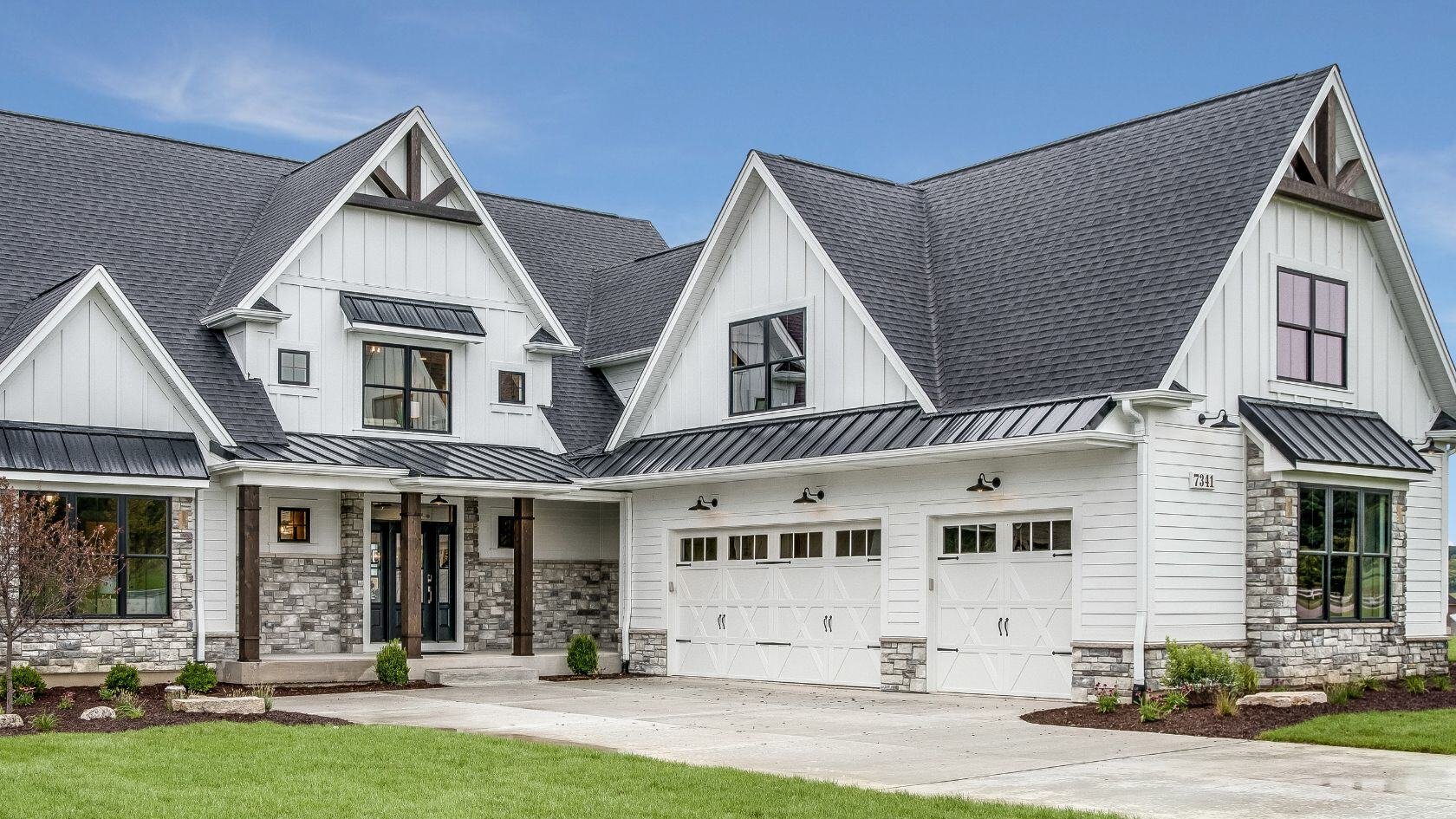 Large house with steep roof and attached ADU in Sacramento by H&H Builds