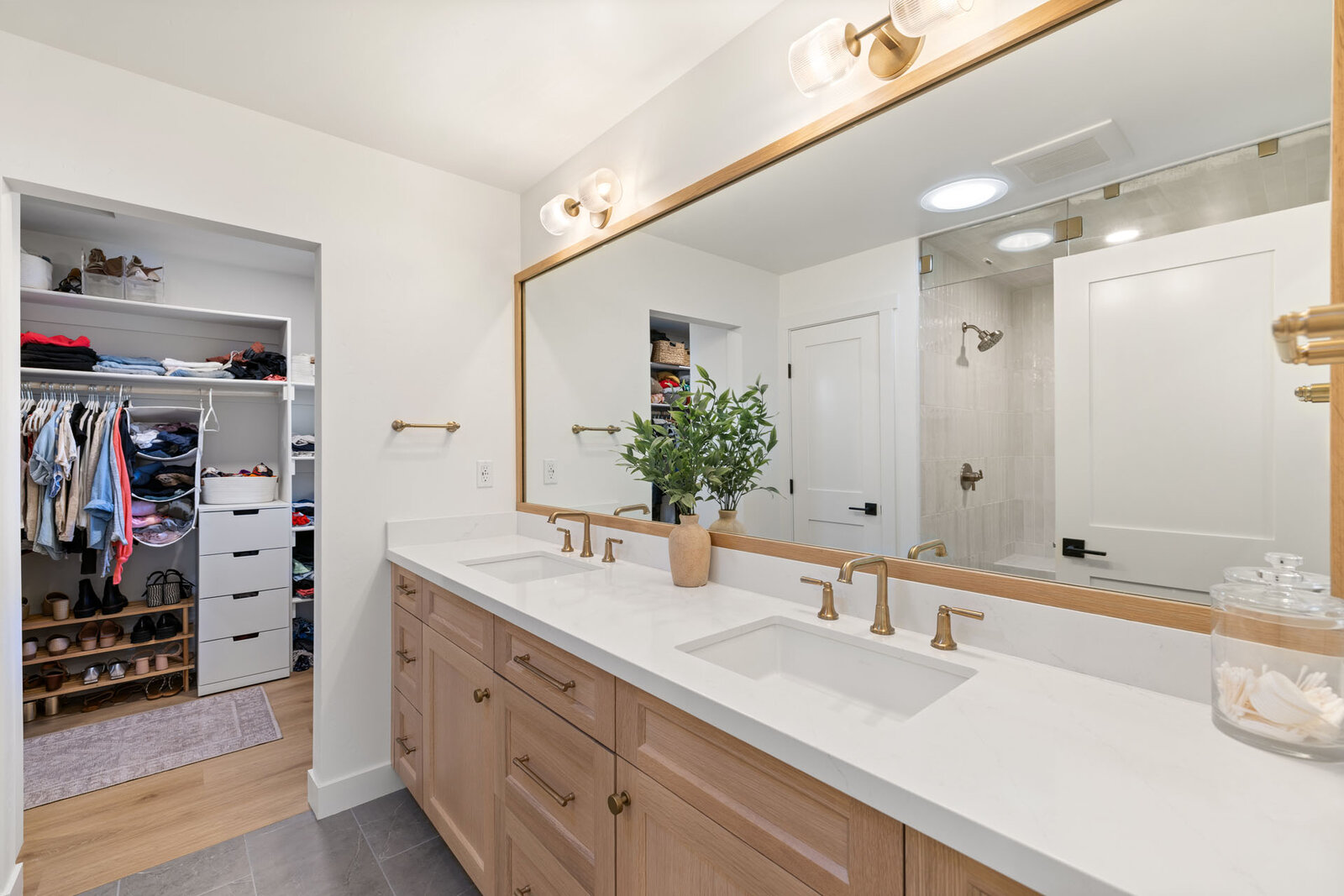 Primary Bathroom remodel in Sacramento, CA with double vanity and brass fixtures